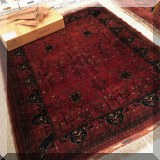 D016. Hand knotted deep red rug. Approx. 6'4” x 5' - $500 